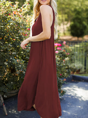 Burgundy asymmetrical hemline tank midi dress with a flowing skirt.