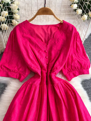 Pink lace-embellished A-line midi dress with V-neck and button detail