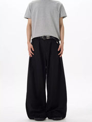 Black relaxed fit pleated men's sweatpants with a casual, comfortable style.
