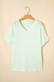Light green waffle knit V-neck t-shirt with cuffed short sleeves.