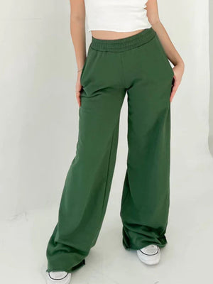 Dark green wide-leg lounge pants with elastic waistband and pockets.