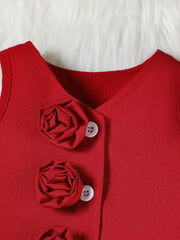 Wine red baby vest with decorative floral appliques and buttons.
