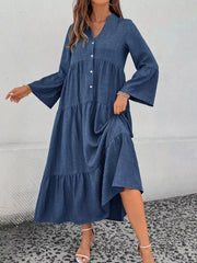 Blue tiered ruffle hem V-neck dress with button front and bell sleeves.
