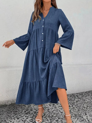 Blue tiered ruffle hem V-neck dress with button front and bell sleeves.