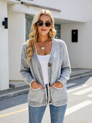 Textured knit cardigan in light gray with contrast trim, button front, and pockets.