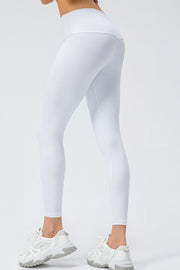 White high-rise performance leggings with a sculpted fit and seamless detail.