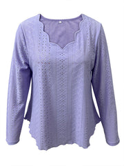 Lavender eyelet blouse with scalloped neckline and long sleeves.
