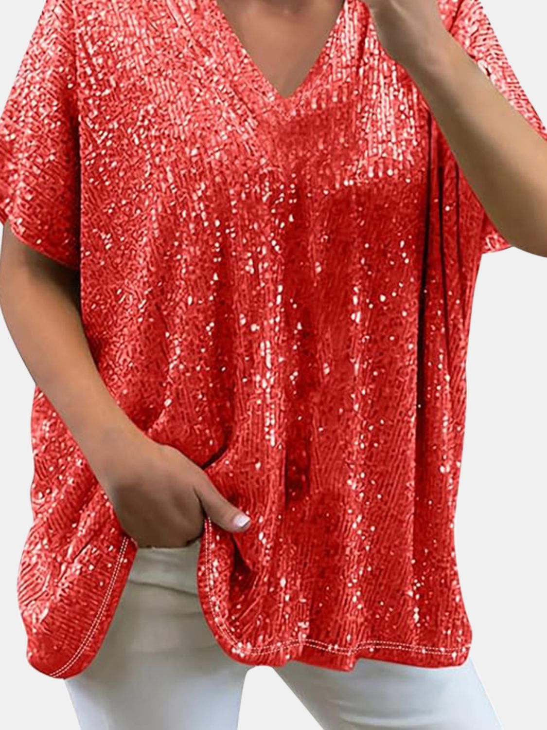 Red sequin slouchy v-neck top with short sleeves and a relaxed fit.