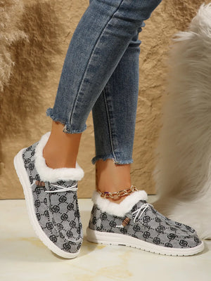 Southwestern print loafers in gray with faux fur lining and white laces.