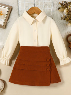 Toddler cream flounce sleeve shirt and brown corduroy skort set with button detail