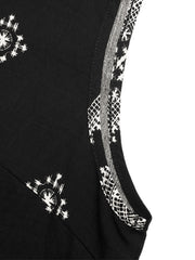 Black sleeveless top with white geometric print and contrast trim detail.