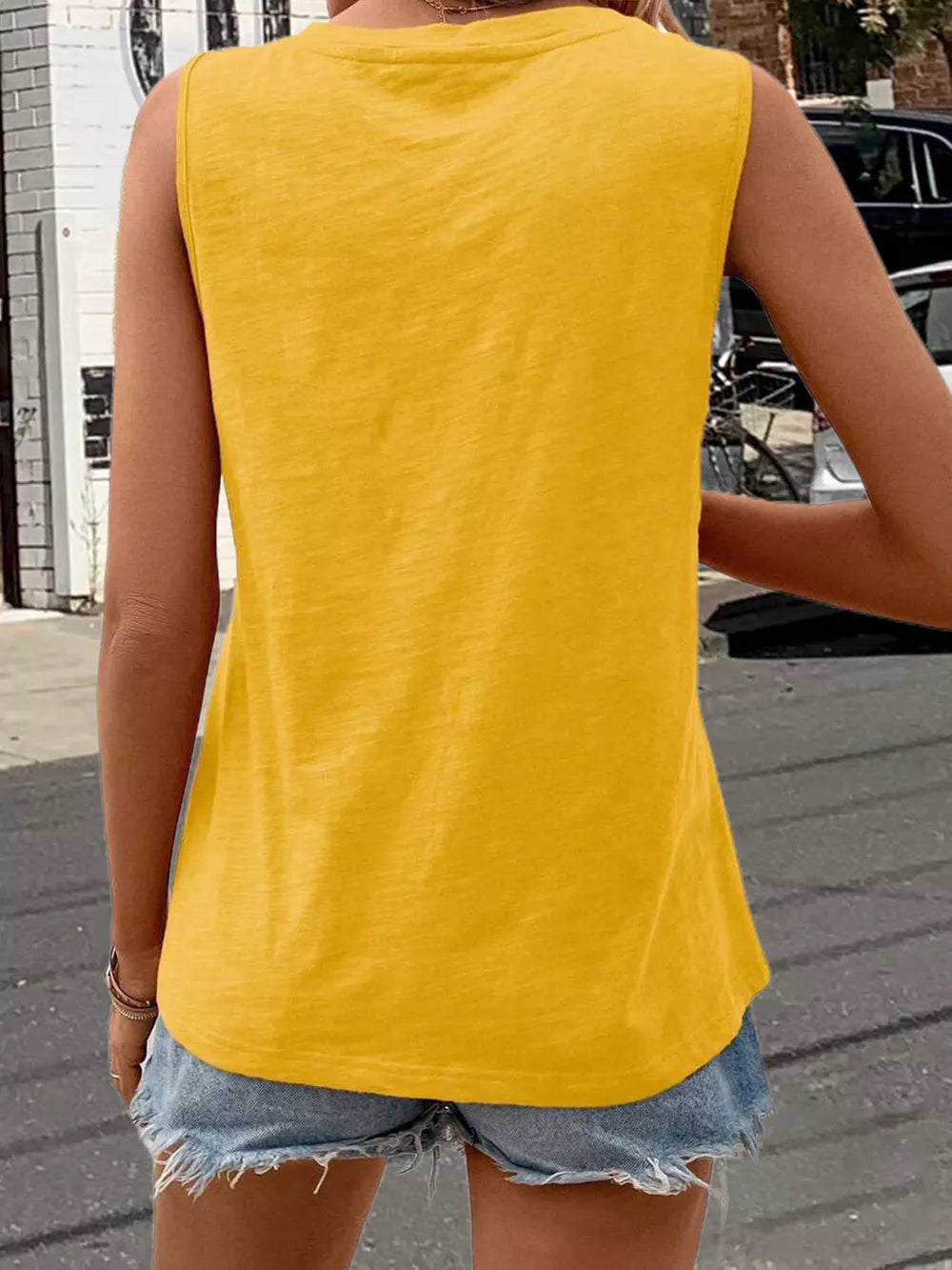 Yellow V-neck tank top with pocket detail, casual basic style