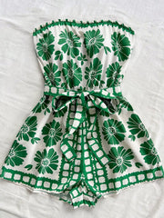 Green floral tie-waist strapless maternity romper with a playful print.