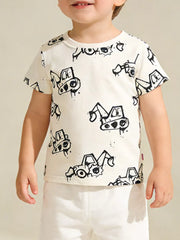 Toddler cream cotton t-shirt with playful black excavator print, short sleeves, crew neck.