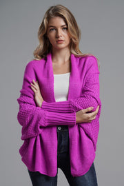 Fuchsia batwing cardigan with drape front and textured sleeves.