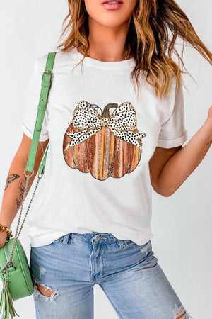 White t-shirt with a striped pumpkin graphic and a dalmatian print bow detail.