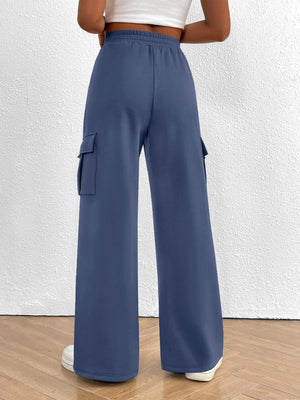 Blue high waist cargo sweatpants with drawstring and side pockets.