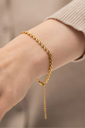 Gold linked heartbeat chain bracelet with adjustable clasp