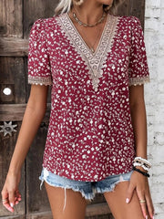 Floral lace trim V-neck blouse in a deep red with a white floral print.