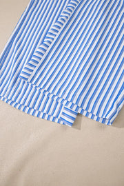 Blue and white striped maternity pants with wide legs and pockets