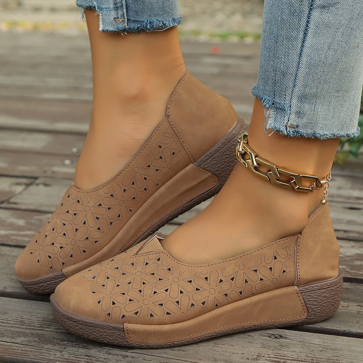 Coffee floral cutout slip-on loafers with a comfortable, breathable design.