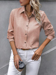 Apricot linen-blend button-down shirt with collared neckline and long sleeves.