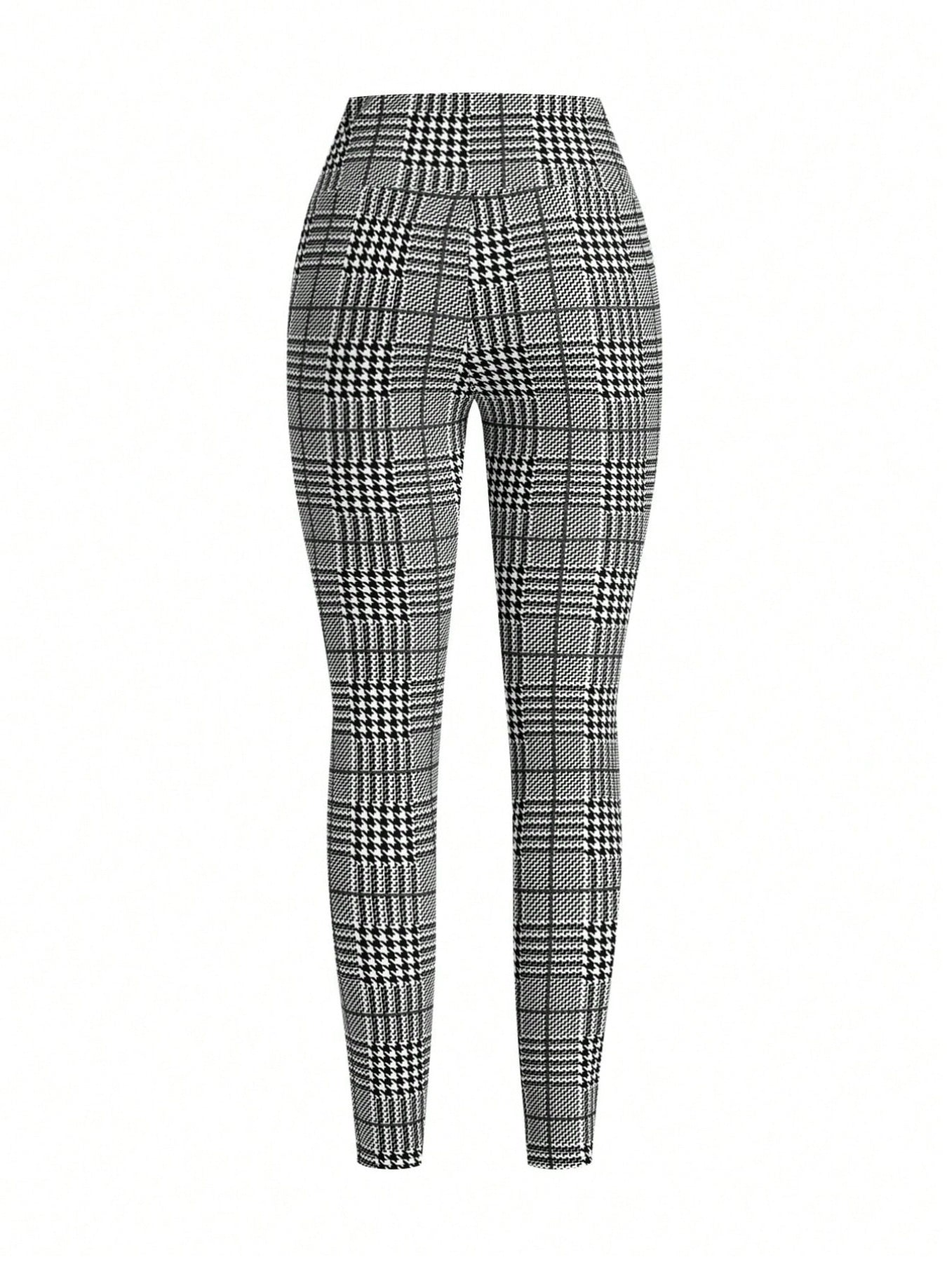 Plaid high waist slim fit ankle length trousers in black and white.
