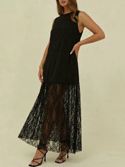 Black sleeveless maxi dress with lace trim skirt and high neckline.