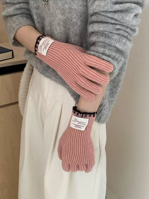 Pink ribbed knit gloves with scalloped cuff and Bonjour label