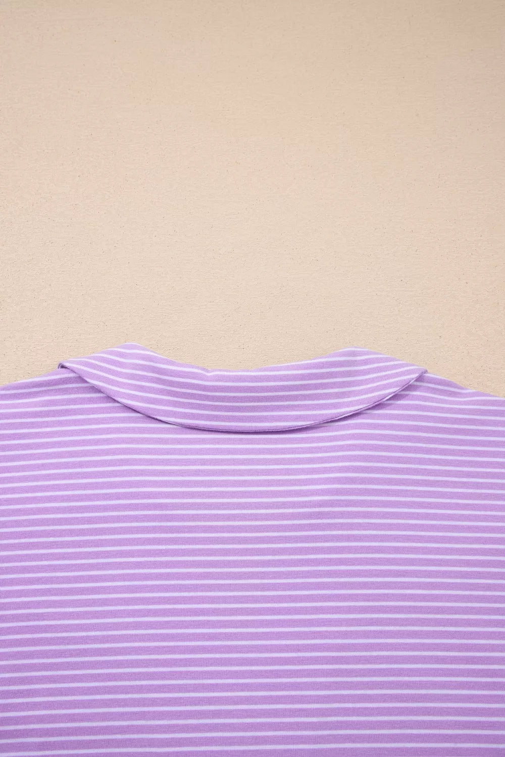 Purple striped polo shirt collar detail, cotton loungewear.