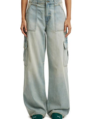 Wide leg cargo denim jeans in light blue with multiple pockets and a relaxed fit.