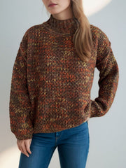 Textured mélange mock neck pullover sweater in brown with orange and yellow flecks.