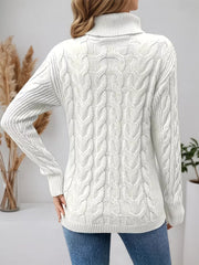 White cable-knit turtleneck sweater with ribbed cuffs and hem.