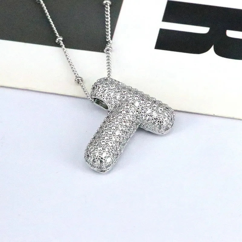 Pave initial pendant necklace with beaded chain, silver tone copper