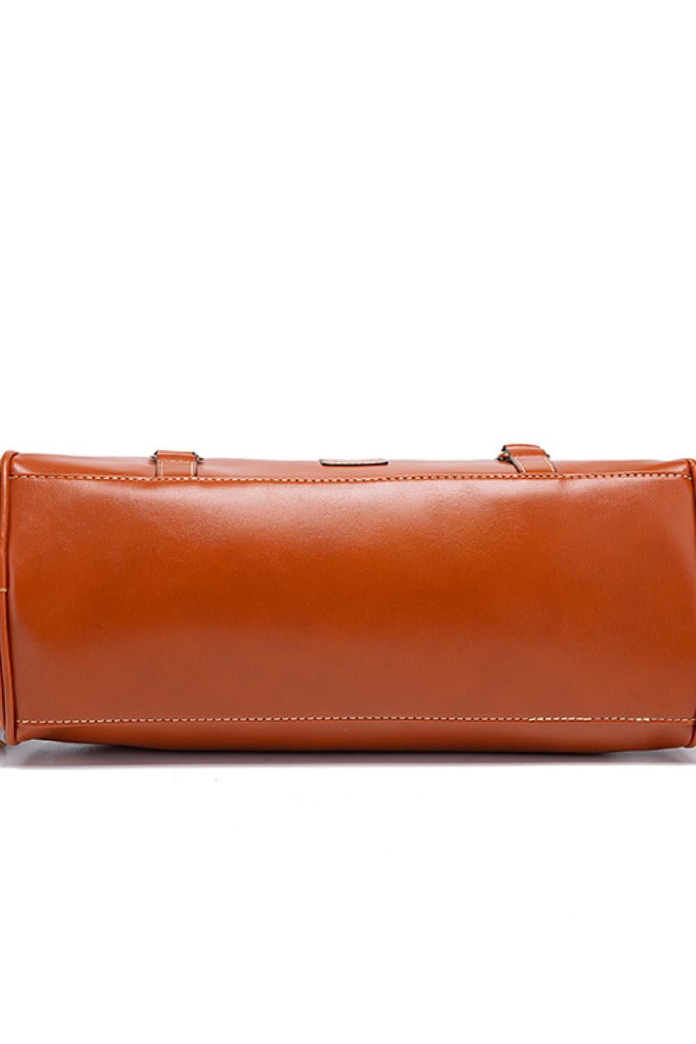 Caramel structured satchel bag with top handles and stitching detail