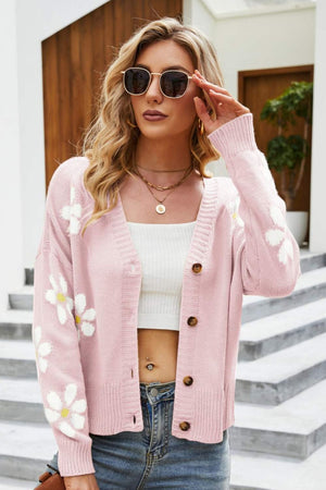 Pink knit button-down cardigan with white daisy embroidery, V-neck, acrylic.
