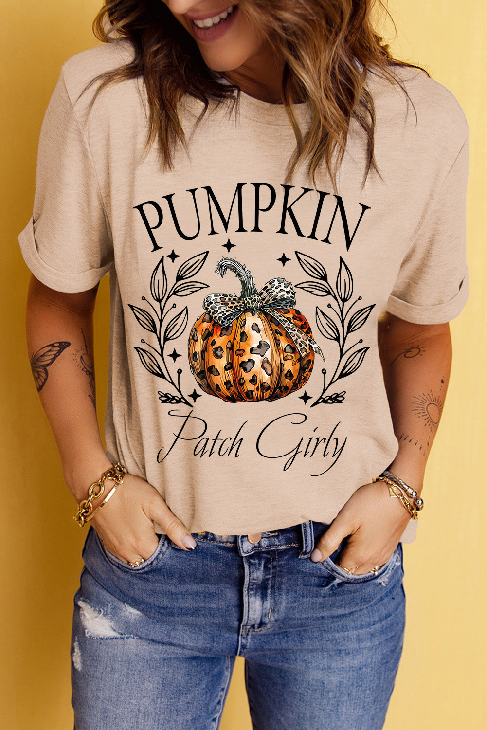 Tan graphic tee with a pumpkin and leopard bow, "Pumpkin Patch Girly" text.