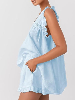 Light blue ruffled V-neck top and shorts set with lace trim and pockets.