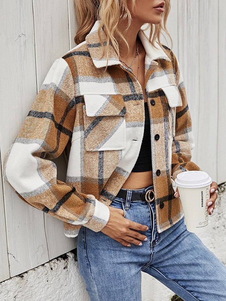 Camel plaid shacket with contrast collar, buttoned front, and chest pockets.