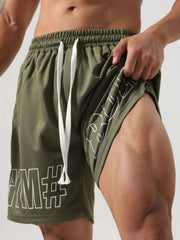 Army green mesh gym shorts with white graphic print and drawstring.