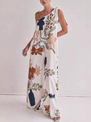 Elegant one-shoulder maxi dress with a bold floral and vase print.