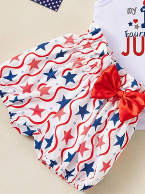 Patriotic baby bloomer shorts with red bow, white bodysuit with "my 1st Fourth" text.