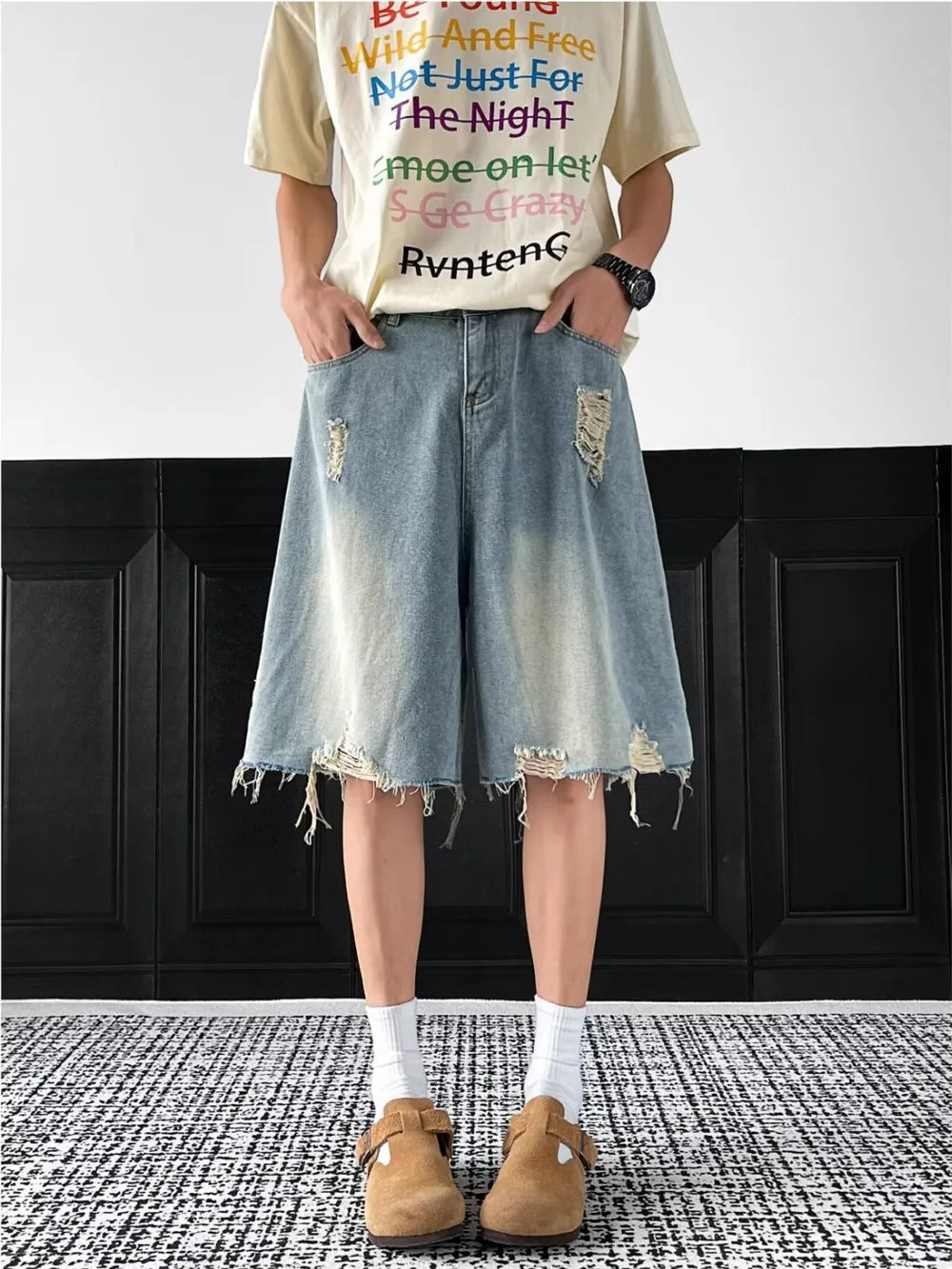 Light-wash denim shorts with distressed details and raw hem, men's casual cotton shorts.