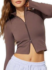 Chocolate high-neck cropped active zip top with thumbholes.
