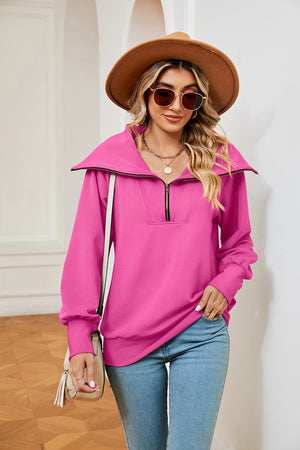 Fuchsia pink wide collar zip-through sweatshirt with a relaxed fit and long sleeves.