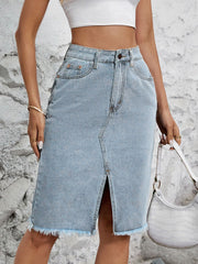 Light blue denim pencil skirt with frayed hem and front slit.