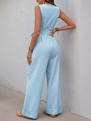 Striped tie-waist wide leg romper in light blue, cotton, with decorative buttons.