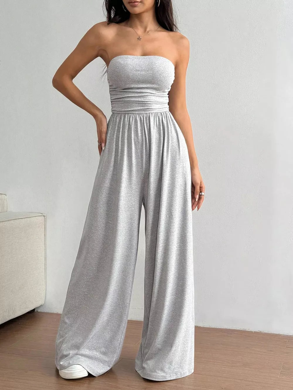 Light gray tube top wide-leg romper with ruched waist detail
