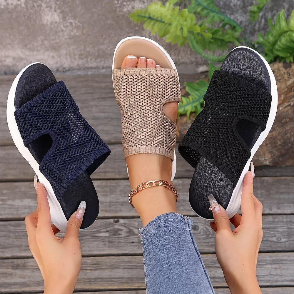 Airy open-toe mesh sandals in khaki, black, and dark blue with comfortable slip-on design.