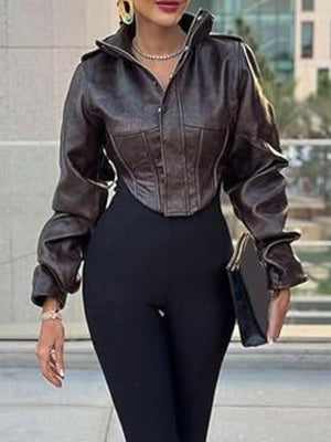 Brown distressed leather jacket with a slim fit, cropped length, and zip-up front.